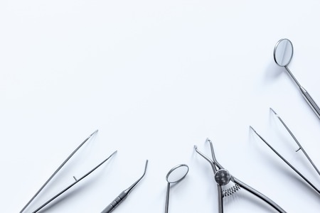 dental tools on white background top view.の写真素材