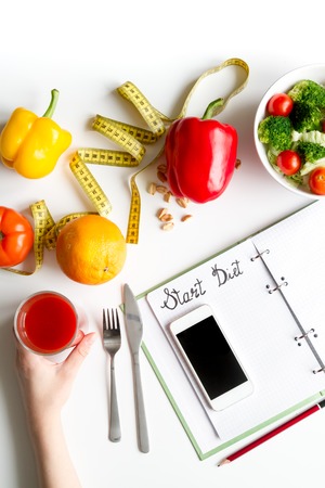 concept diet and slimming plan with vegetables top view mock upの写真素材