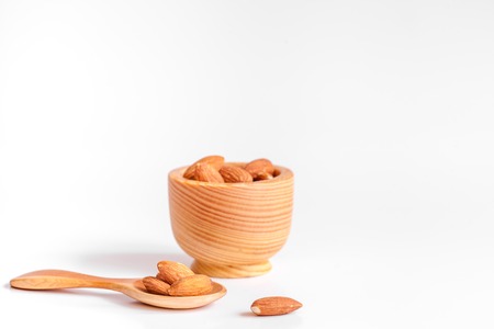 cosmetic almond oil in glass bottle on white background.の写真素材