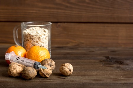 concept food allergies on wooden background close upの写真素材
