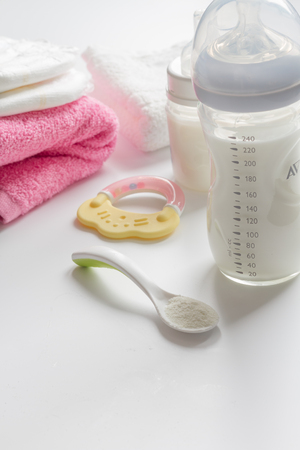 preparation of mixture baby feeding on white backgroundの写真素材