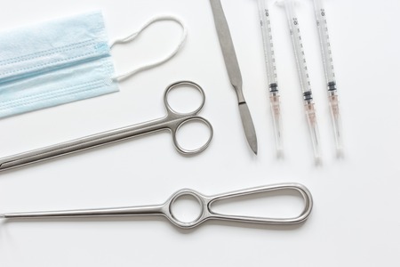 instruments for cosmetic surgery on white background top viewの写真素材