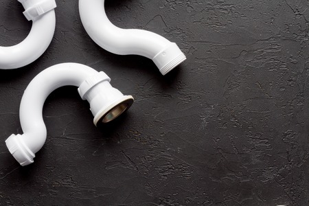 concept plumbing work top view on dark background.の写真素材