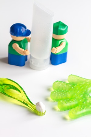 childrens toothbrush oral care on white backgroundの写真素材