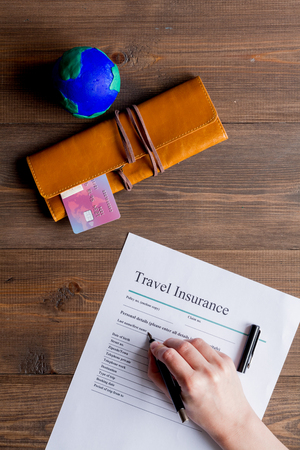 travel booking concept top view on wooden background mock upの写真素材