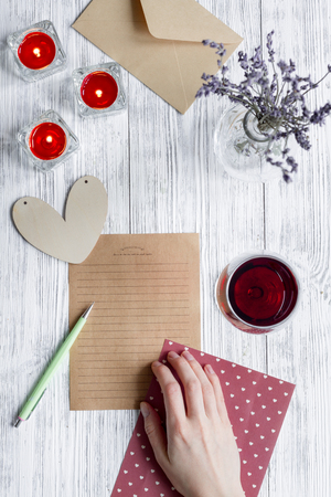 concept Valentines Day love letter wooden background top viewの写真素材