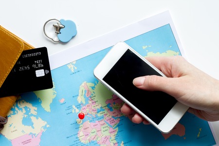 travel booking concept top view on white background mock upの写真素材