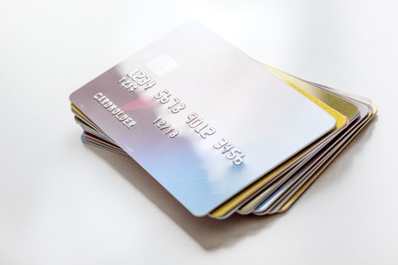 credit cards, key ring - concept mortgage on white backgroundの写真素材
