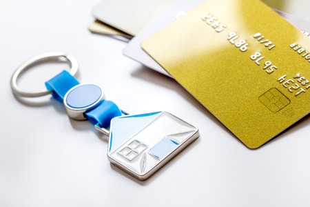 credit cards, key ring - concept mortgage on white backgroundの写真素材