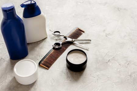 mens cosmetics for hair in bottle at bathroom