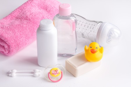 baby organic cosmetic for bath on white bakground close up