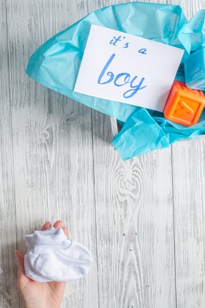 birth of boy - baby shower concept on wooden background top viewの写真素材
