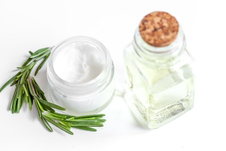 organic cosmetics with extracts of herbs - rosemary on white backgroundの写真素材
