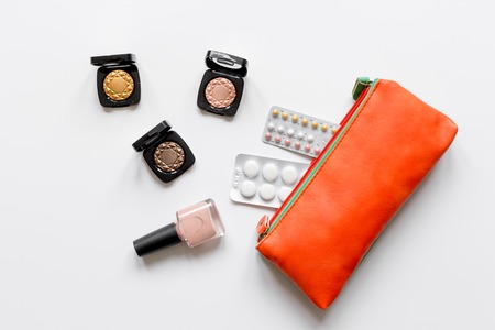 concept of female contraception and healthcare on white background close upの写真素材