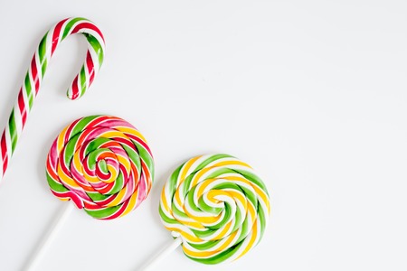 sweets and sugar candies on white background top view.の写真素材
