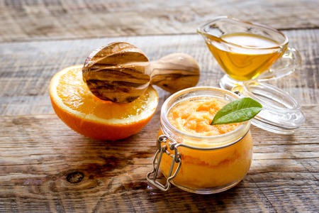 organic citrus scrub homemade on wooden background.の写真素材