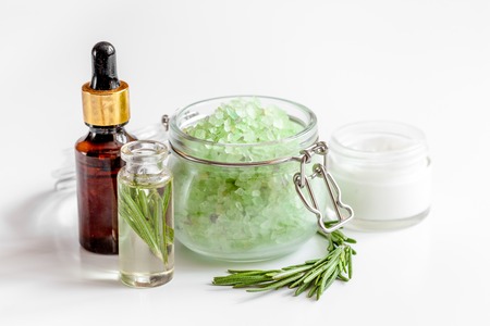 organic cosmetics with extracts of herbs - rosemary on white backgroundの写真素材