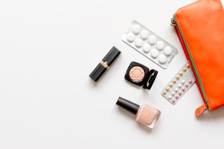 concept of female contraception and healthcare on white background close upの写真素材