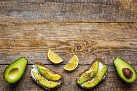 making sandwiches with avocado healthy organic food top view.の写真素材