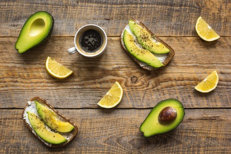 making sandwiches with avocado healthy organic food top view.の写真素材