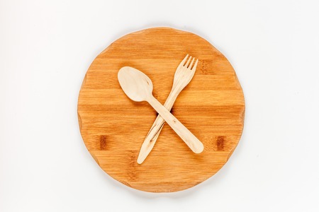 wooden kitchen utensils on white background top viewの写真素材