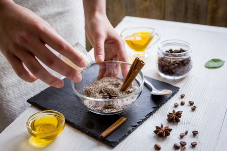 making organic scrub handmade at home with handsの写真素材