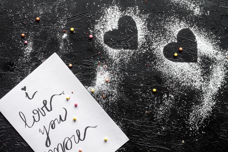 concept of Valentines Day cupcakes dark background top viewの写真素材