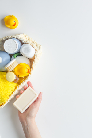 baby accessories for bath with duck on white background.の写真素材