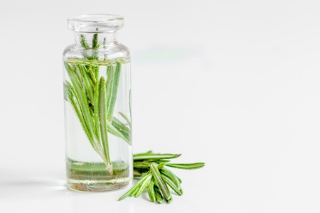 organic cosmetics with extracts of herbs - rosemary on white backgroundの写真素材