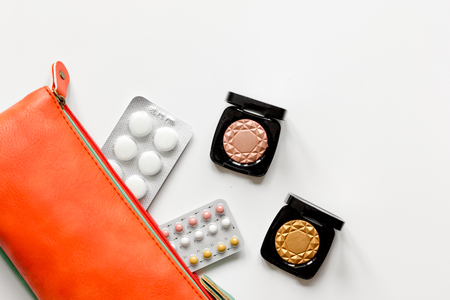 concept of female contraception and healthcare on white background concept of female contraception and healthcare on white background