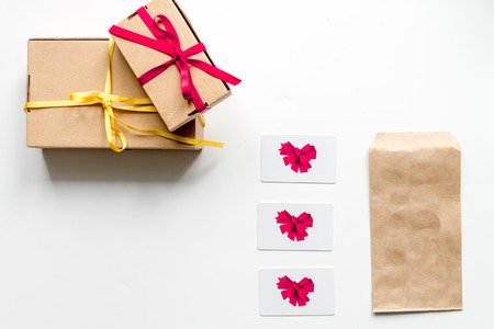 concept of gift cards on white background top view