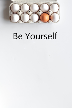 concept of correct choice eggs on white background top view.