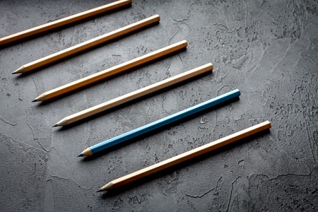 concept selection options with pencils on dark background top viewの写真素材