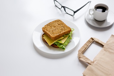 concept of lunch break at work top view mock upの写真素材