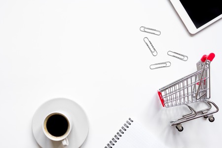 concept online shopping with smartphone on white background mock up top view