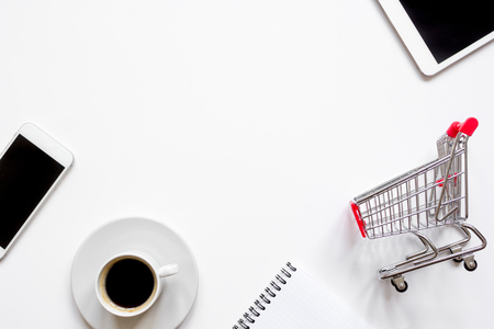 concept online shopping with smartphone on white background mock up top viewの写真素材