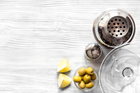 martini and shaker top view of wooden background.の写真素材