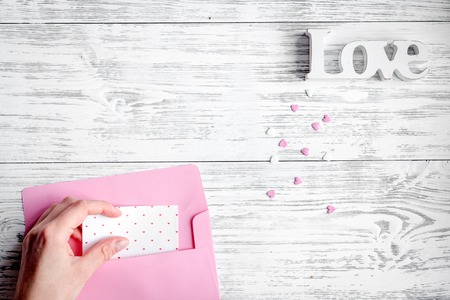 concept Valentines Day with flower wooden background top viewの写真素材