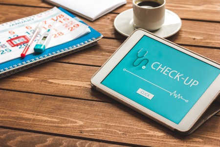 concept time health check up on white backgroundの写真素材