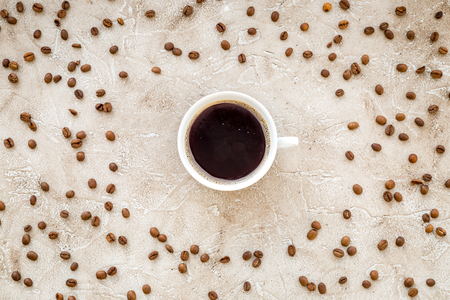 coffee beans on gray with coffe cup table top view.の写真素材