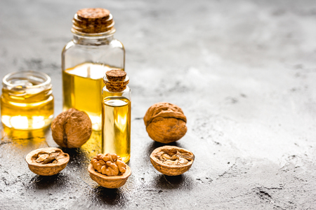 cosmetic and therapeutic walnut oil on dark background.の写真素材