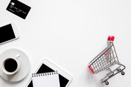 concept online shopping with smartphone on white background mock up top viewの写真素材