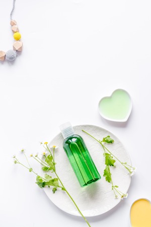 natural organic cosmetics for baby with chamomile on white background top viewの写真素材