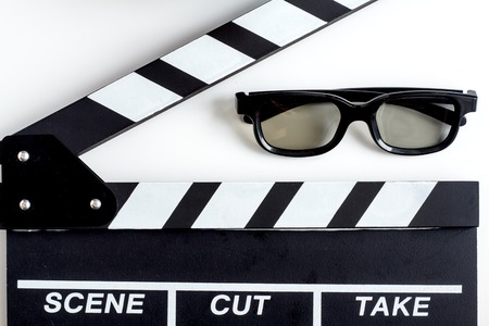 concept of watching movies with popcorn top view white background