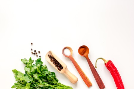 spices in wooden spoon on white background top viewの写真素材