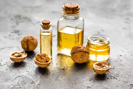 cosmetic and therapeutic walnut oil on dark background.の写真素材