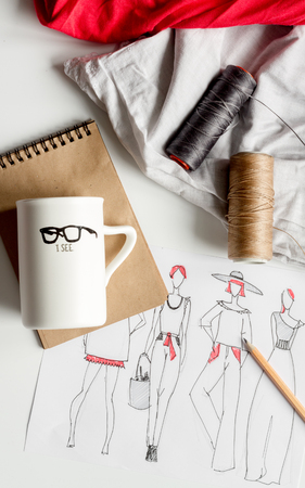 desktop designer clothes with tools top view mock upの写真素材