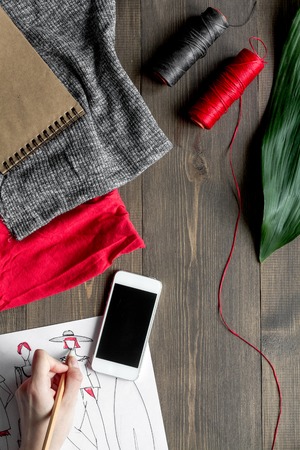 desktop designer clothes with tools top view mock upの写真素材