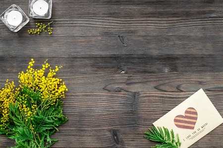 Concept International Women's Day with flowers wooden layout top view.の写真素材