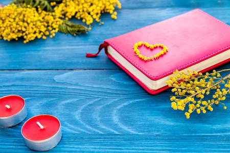 Concept gift flowers on wooden table mock up.の写真素材